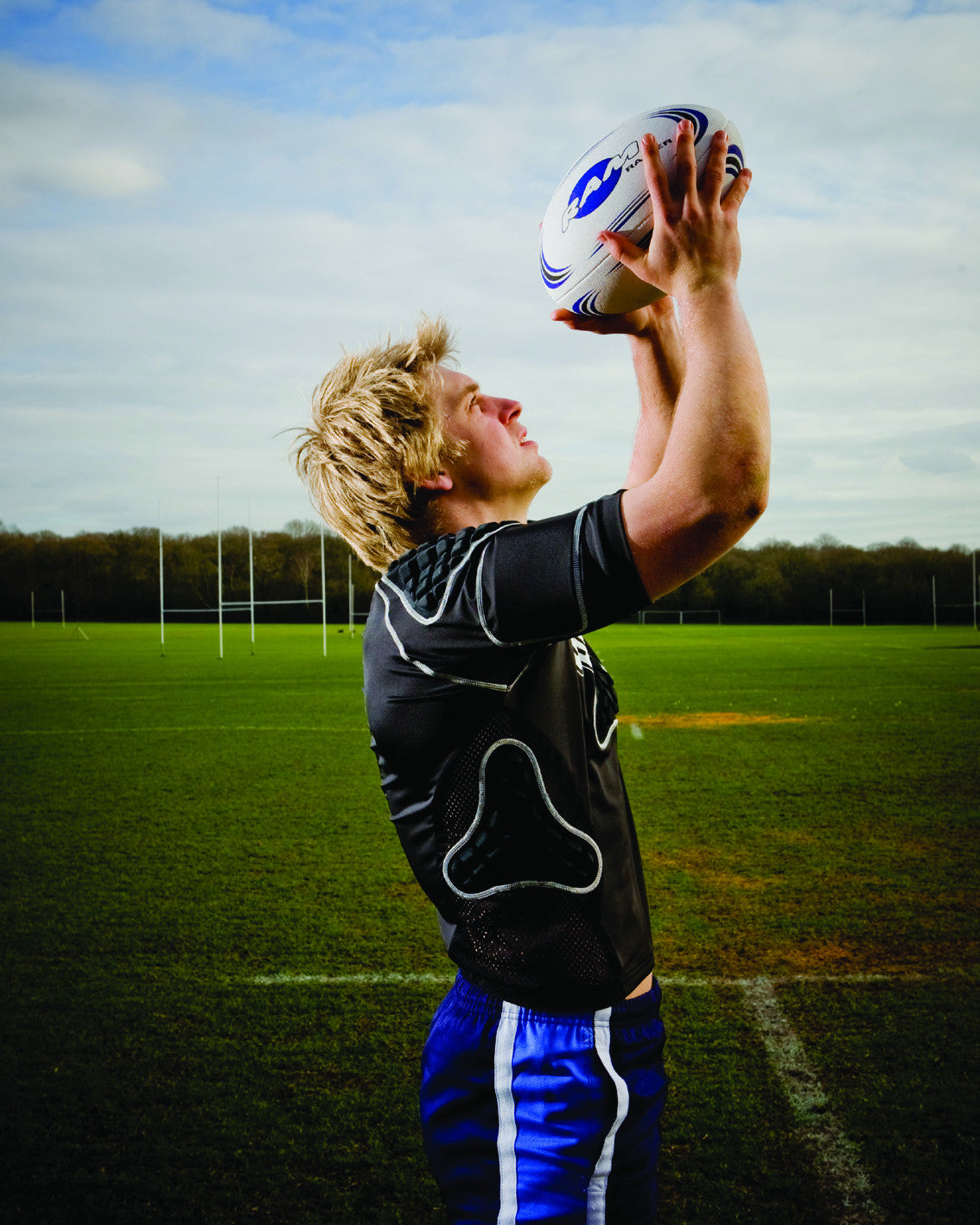Black Ram Rugby Protec shoulder pads showing detailed padding for shoulders, ribs, and upper torso with ventilated mesh design