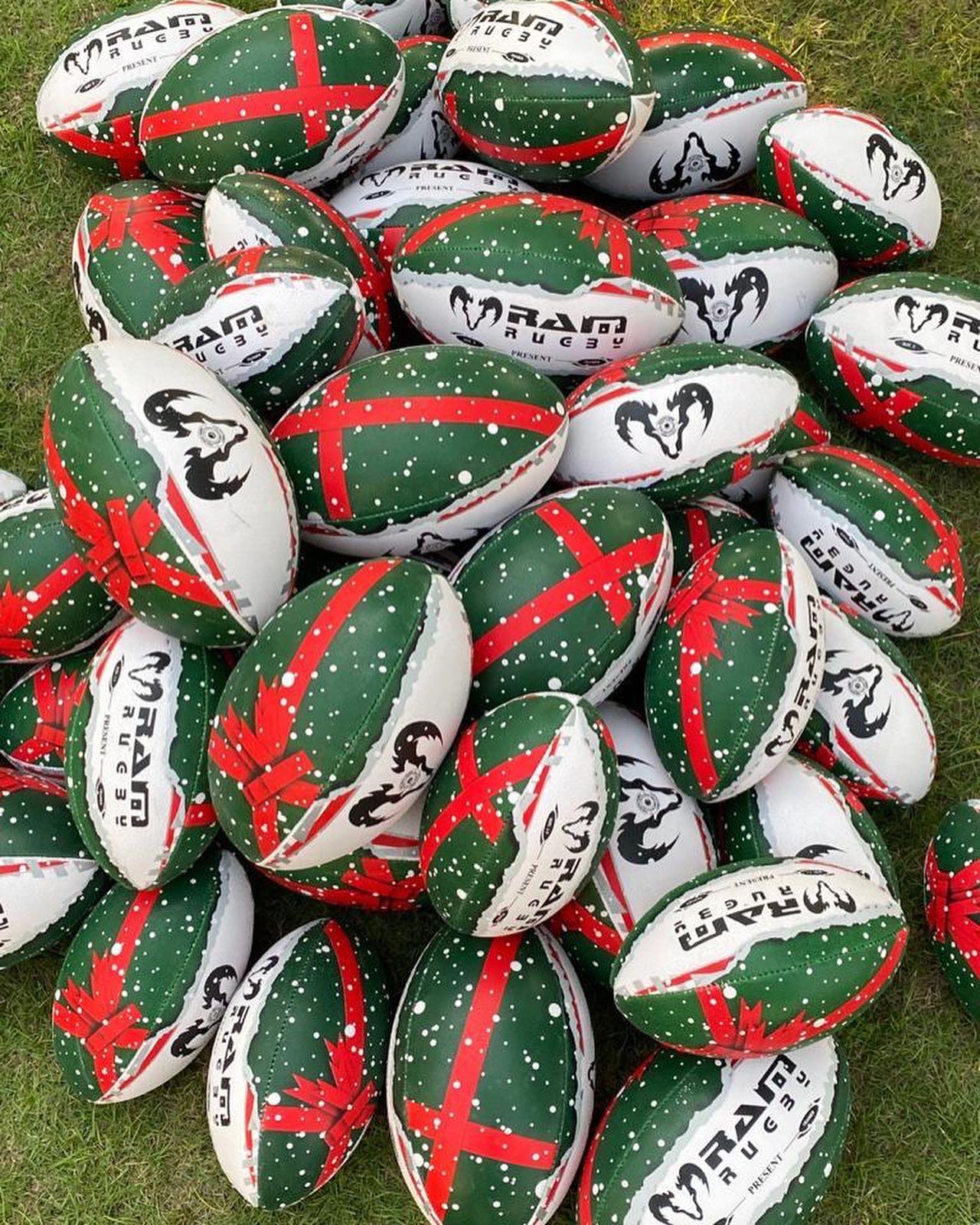Ram Rugby Christmas Midi Squad Trainer Ball Size 2 showing festive red and green wrap with white star accents for training use
