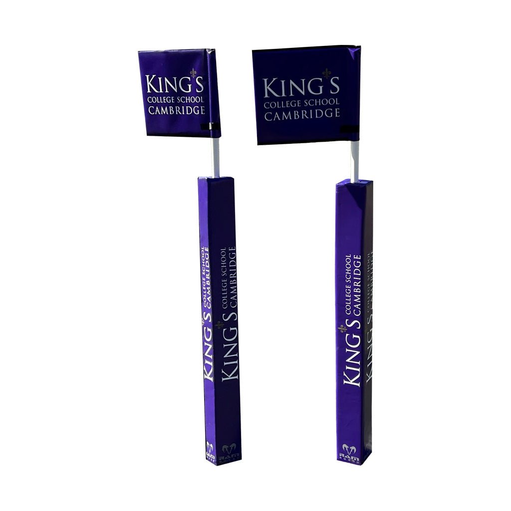 Ram Rugby custom foam pole protectors in bright orange, designed to shield rugby goal posts near the try line.