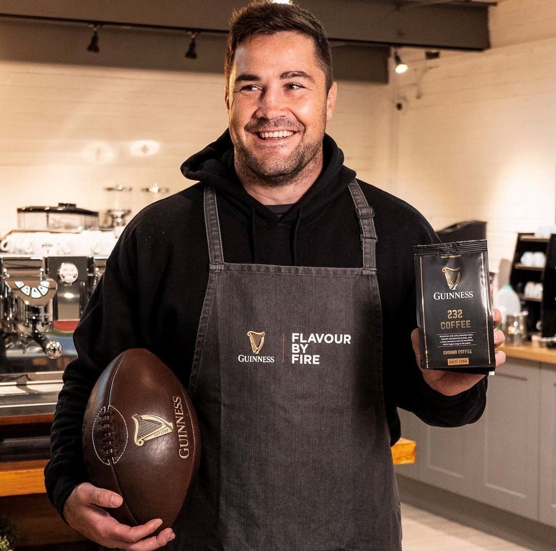 Close-up of Ram Rugby Custom Vintage Leather Heritage Rugby Ball Size 5 showing embossed logo on brown leather surface with classic stitching