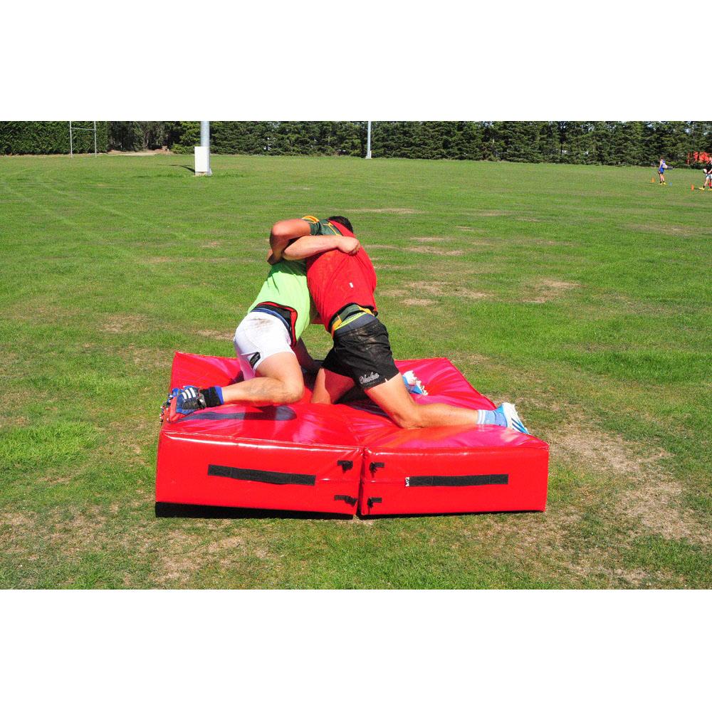 Red Ram Rugby heavy-duty tackling mat with reinforced PVC base, designed for crash, wrestling, and tackling training sessions.