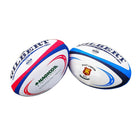 Custom Gilbert rugby balls by Ram Rugby featuring vibrant club logos on white synthetic leather for team branding.
