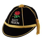 Ram Rugby Custom Honours Cap in navy velvet with gold crest and white embroidered initials, featuring silk tassel and cotton lining