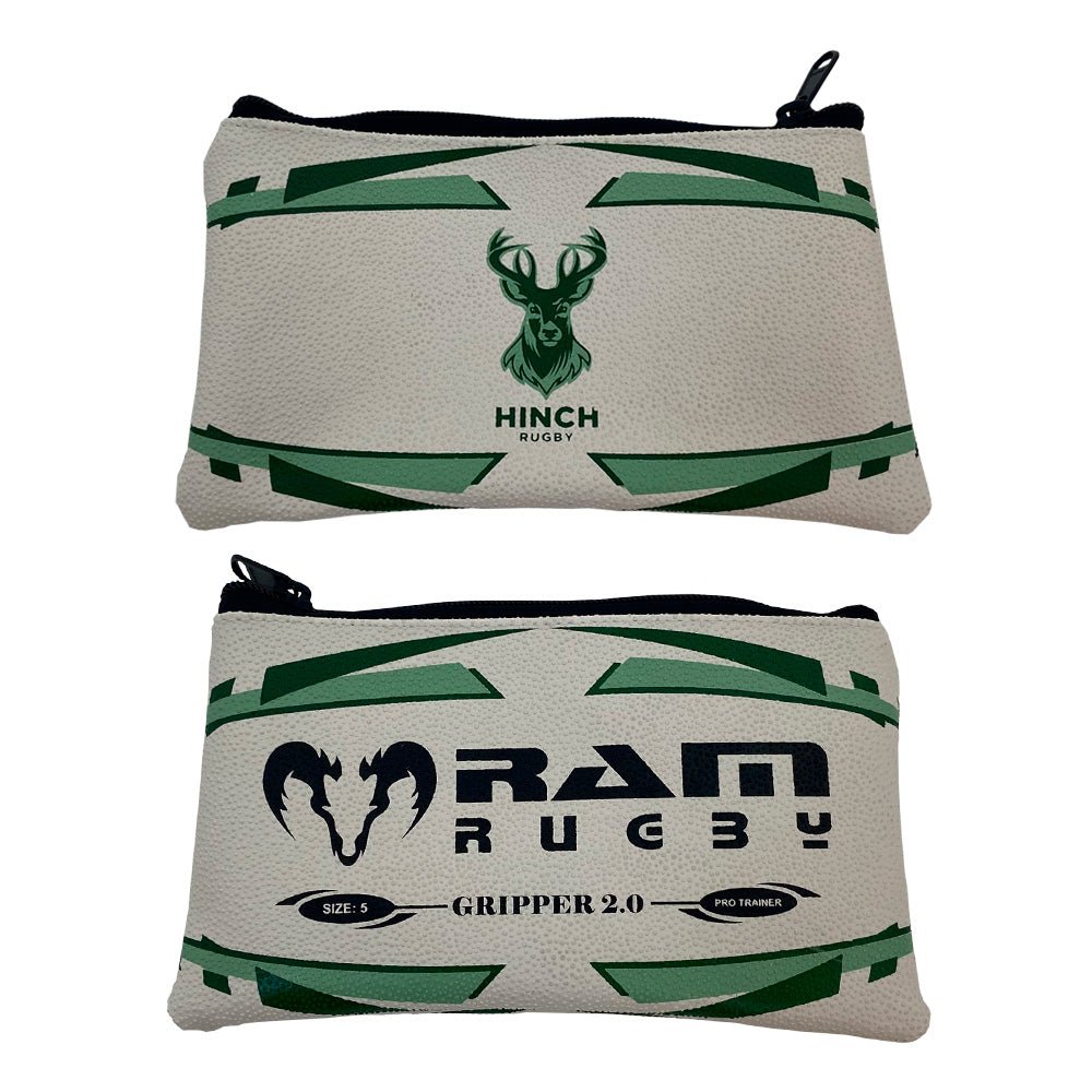 Ram Rugby custom rugby ball pencil case showing durable black rubber grip texture and cotton-lined zippered pouch interior.