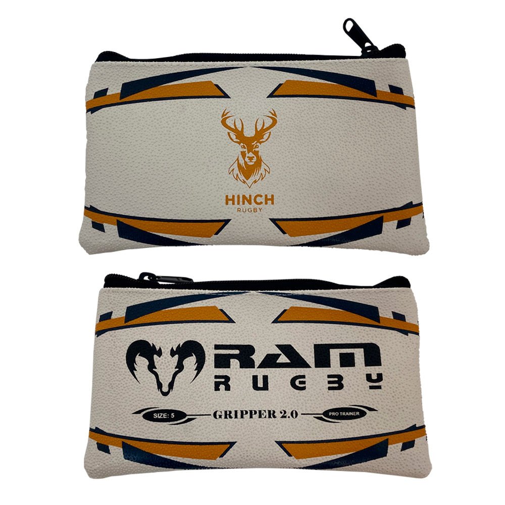 Ram Rugby custom rugby ball pencil case in brown rubber with white stitching and personalized logo, durable grip texture