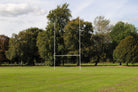 Ram Rugby 6m white steel fixed socketed rugby goal posts with two crossbars and durable 70mm diameter uprights for stability