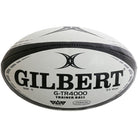 Thirty Gilbert G-TR4000 trainer rugby balls stacked with two large breathable bags for size 5 ball storage and transport