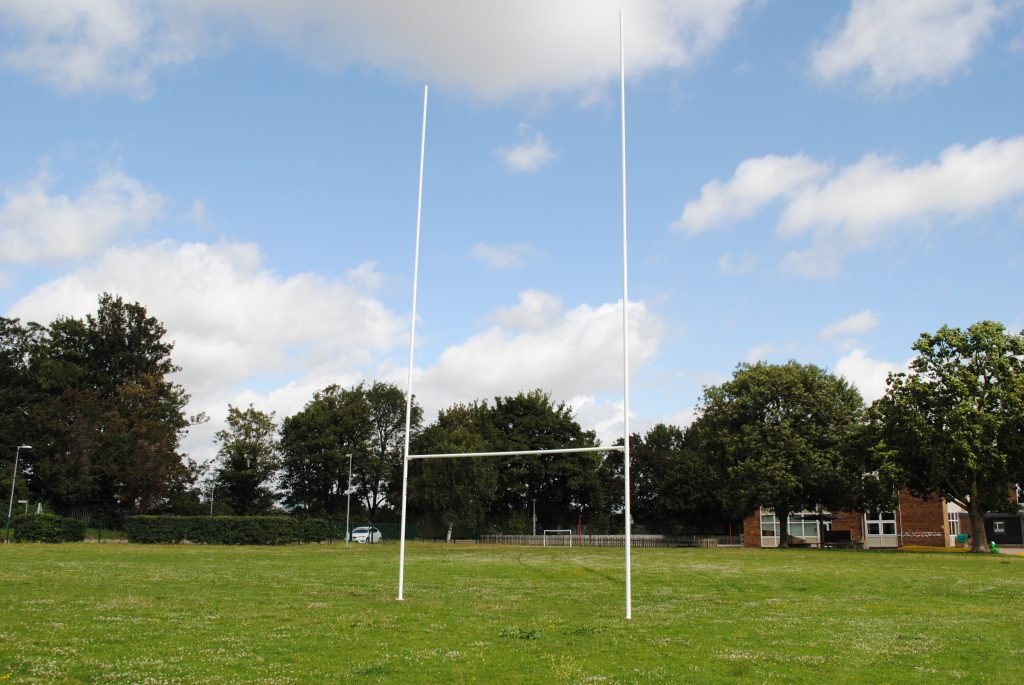 Ram Rugby 6m steel hinged rugby goal posts with white crossbars and 70mm tubular steel uprights for durability