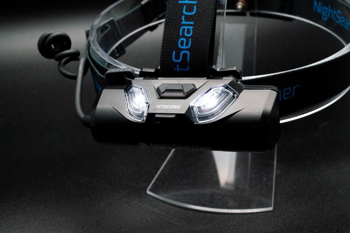 Nightsearcher HT800RX USB rechargeable head torch showing adjustable strap and 800 lumen narrow beam light in use
