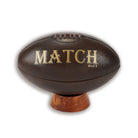 Close-up of Ram Rugby Vintage Style Heritage leather rugby ball in brown, size 5, showcasing embossed branding details and texture